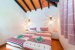 Una cama o camas en una habitación de One bedroom property with shared pool and terrace at Таvira 1 km away from the beach