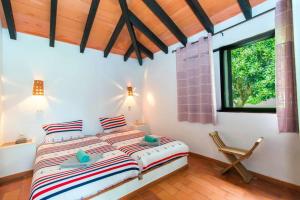Una cama o camas en una habitación de One bedroom property with shared pool and terrace at Таvira 1 km away from the beach