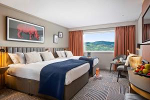 Postel nebo postele na pokoji v ubytování Talbot Hotel Clonmel