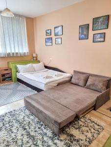 Llit o llits en una habitació de Студио апартамент Троян