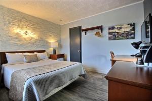 Postel nebo postele na pokoji v ubytování Hotel Motel Le Quiet