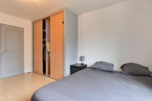 Säng eller sängar i ett rum på Proche GE/Alstom, Le Belfortain, wifi, parking