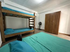 Postel nebo postele na pokoji v ubytování RokaDura Hotel