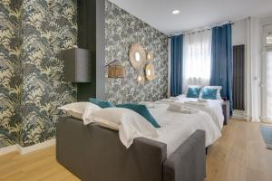 Tempat tidur dalam kamar di 195 Suite Royal - Superb apartment in Paris