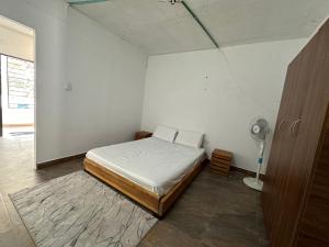 Postel nebo postele na pokoji v ubytování RokaDura Hotel