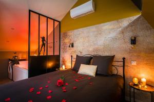 Ένα ή περισσότερα κρεβάτια σε δωμάτιο στο Duplex coup de coeur