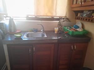 Virtuvė arba virtuvėlė apgyvendinimo įstaigoje Bugara Homestay
