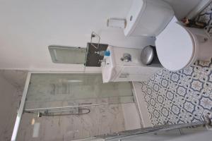 a camera in a room with a glass table at Forest view cottage in Nottingham +12 photos