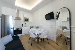 Cucina o angolo cottura di GRAN VIA capitals by MONARO*****
