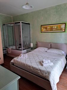 Posteľ alebo postele v izbe v ubytovaní Bosa Guest House