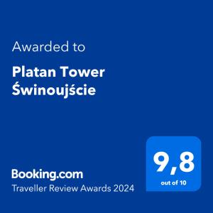 a blue phone screen with the text awarded to planan tower symposium at Golden Hour Apartments - Platan Tower in Świnoujście