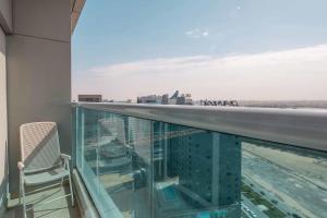 a balcony with a view of a building at Frank Porter - Elite Business Bay Residence in Dubai