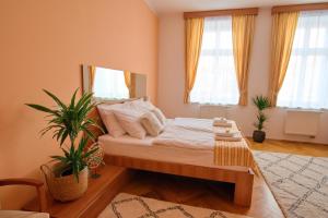 Postel nebo postele na pokoji v ubytování Hotel Grand
