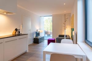Kuchyň nebo kuchyňský kout v ubytování Strandlust 21A Appartement