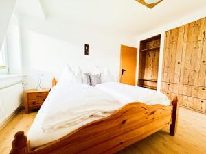 Postel nebo postele na pokoji v ubytování Ferienhaus Am Hofacker