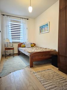 Postel nebo postele na pokoji v ubytování Schicke 2-Zimmer-Wohnung im Vintage-Look