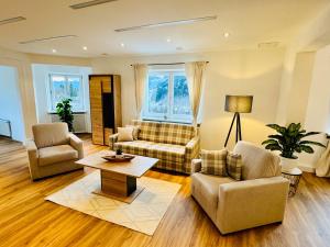 Posezení v ubytování Ferienhaus Am Hofacker