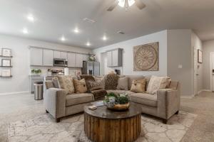 a living room with a couch and a coffee table at Entire House~ Spacious~ Prime Location~ Backyard in Lubbock