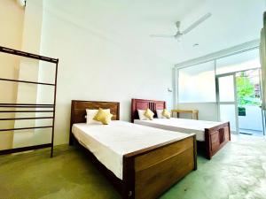 Postel nebo postele na pokoji v ubytování Surf & Salt