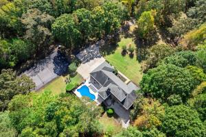 an overhead view of a house in the woods at Grand Retreat - Luxury Vacation for Large Groups in Fayetteville