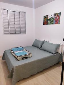 Ein Bett oder Betten in einem Zimmer der Unterkunft Apto Decorado 2 quartos c/ Estacion-Jd Nova Europa-Campinas