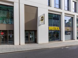 a facade of a hotel on a city street at B&B Hotel Marburg in Marburg an der Lahn