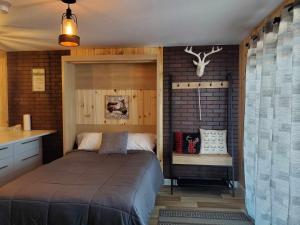 Postel nebo postele na pokoji v ubytování Motel domaine l'Avantage