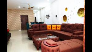 Posezení v ubytování Mandolin Homestay in Dibrugarh - 2BHK Apartment