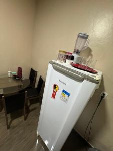 Kuchyň nebo kuchyňský kout v ubytování Espaço inteiro - Quarto e cozinha
