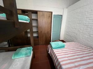 Voodi või voodid majutusasutuse Finca Aguadalupe, Lago Calima toas