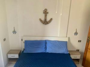 Cama ou camas em um quarto em 2 bedrooms property at Villasimius 1 km away from the beach