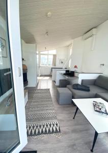 Køkken eller tekøkken på Ferienhaus Kleine Auszeit Marina Wendtorf