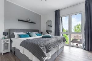 Postel nebo postele na pokoji v ubytování Ostseeoase Damp + 20 fotografií