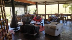 Un lugar para sentarse en Paradise View Guesthouse