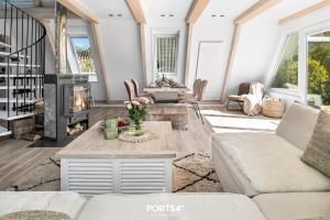 Posezení v ubytování Lounge am Meer