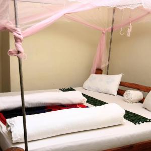 Voodi või voodid majutusasutuse Sipi Guest House toas