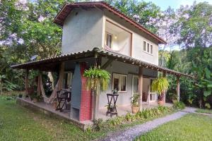 Κήπος έξω από το Casa com Quintal Ideal para o Pet e Churrasqueira