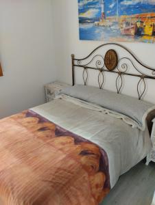 Кровать или кровати в номере Playa-Pinares-Felicidad