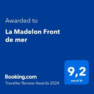 ein blauer Bildschirm mit dem Text, der an la madrid front die mer verliehen wurde in der Unterkunft La Madelon Front de mer in Villers-sur-Mer