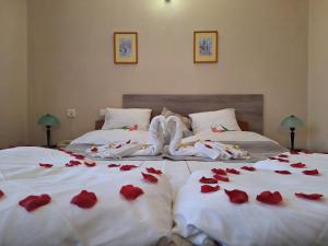 Postel nebo postele na pokoji v ubytování Hotel Unicornis