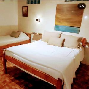 Postel nebo postele na pokoji v ubytování Esquina Apart Hotel + 37 fotografií