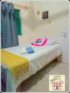 Letto o letti in una camera di En renta toda una casa en puerto angel Oaxaca para un grupo de personas