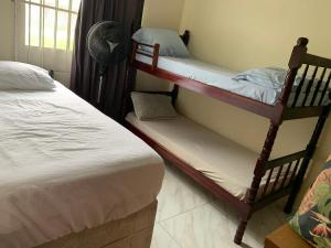 En eller flere senge i et værelse på Casa da esquina