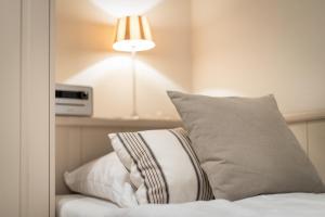 Ein Bett oder Betten in einem Zimmer der Unterkunft Düün Hüs, App. 2