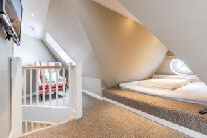 Postel nebo postele na pokoji v ubytování Strandresidenz Wohnung Langeness