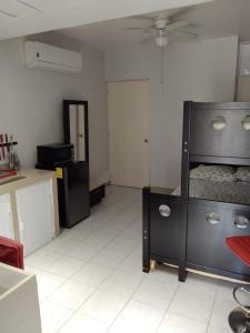 a bedroom with a bunk bed in a room at Pequeño y acojedor departamento muy bien ubicado in Veracruz