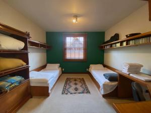 Ένα ή περισσότερα κρεβάτια σε δωμάτιο στο Casa do Pintor