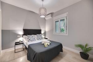 En eller flere senge i et værelse på XPCE Rodeo Beach - Puerto Banus + 52 billeder