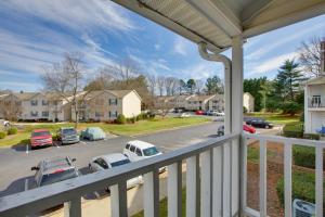 a balcony with a view of a parking lot at Greensboro Vacation Rental Condo Near Downtown in Greensboro