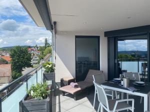En balkon eller terrasse på Premium Apartment Hägerstraße